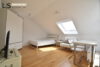 **Top modern & voll möbliert** Exklusives 1-Zimmer-Studio mit Balkon und TG-Stellplatz! - Wohn-/Schlafbereich