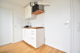Küchnebereich - *Top modern & voll möbliert* Exklusives 1-Zimmer-Studio mit Balkon und TG-Stellplatz!