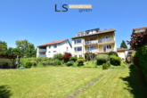 Gartenansicht - Wohntraum mit Potenzial: 4,5-Zimmer-Etagenwohnung mit 2 Balkonen, Garage & Garten in Oberesslingen!